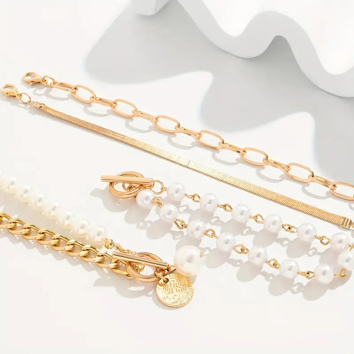 Orla & James - Chic Gold 4-Piece Bracelet Set: Snake, Pearls & Links